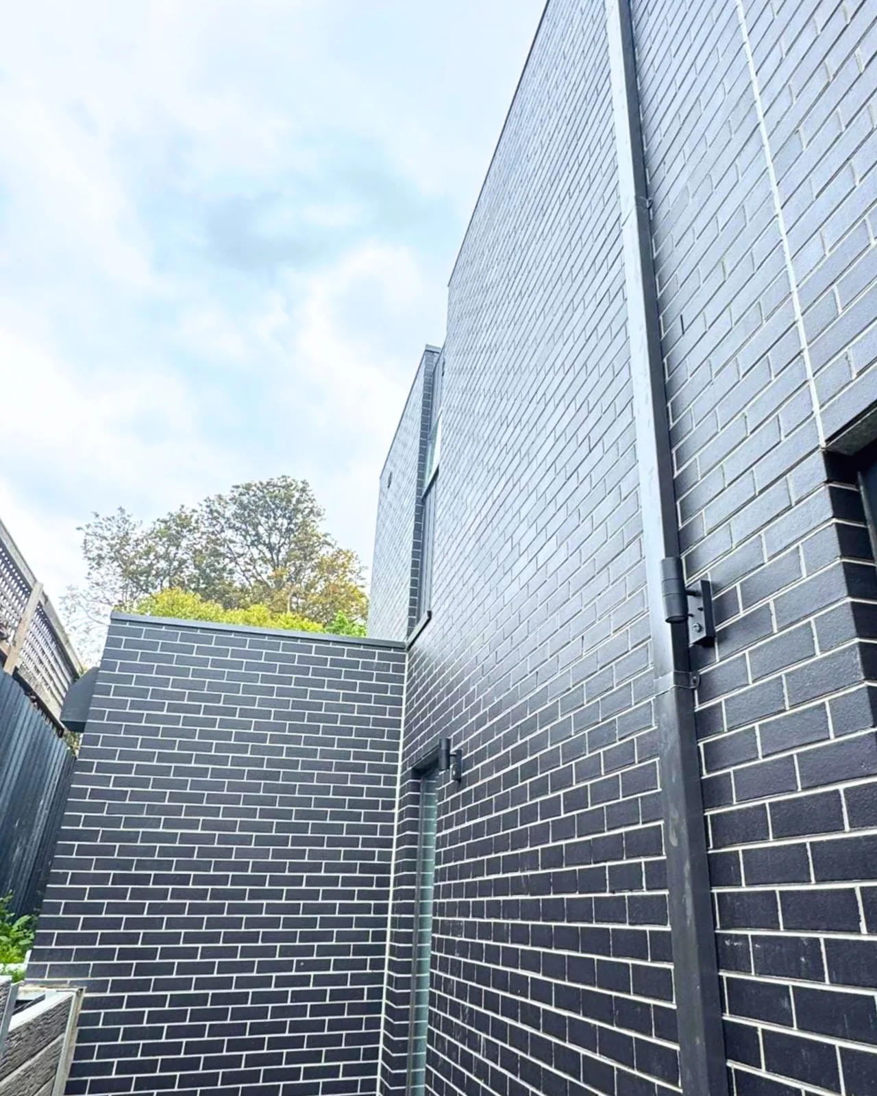 Black brick facade system on a Balwyn townhouse development
